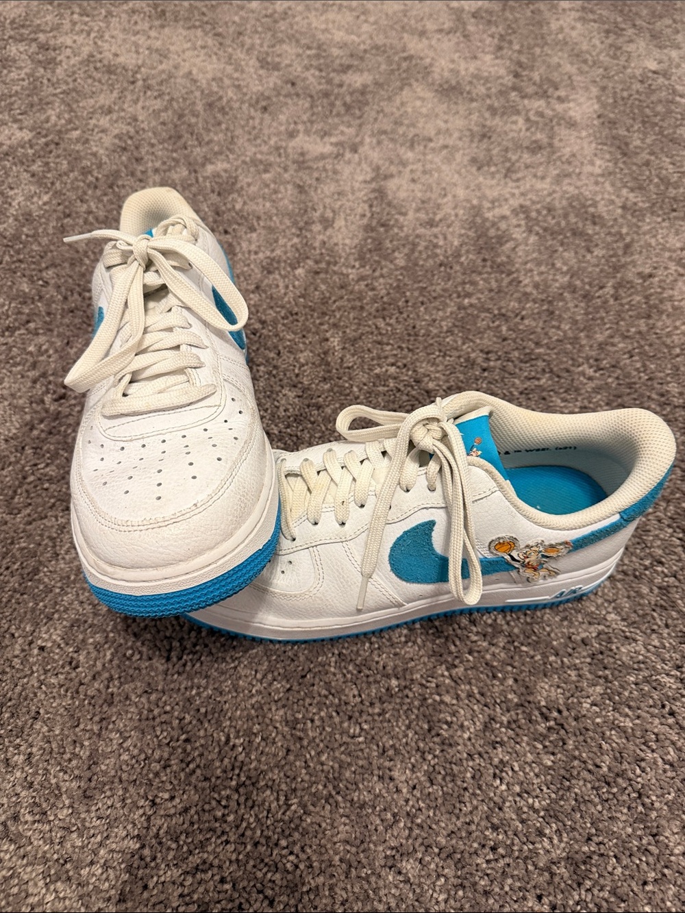 Nike White and Blue Low-Top Air Force 1 Sneakers with Cartoon Detail